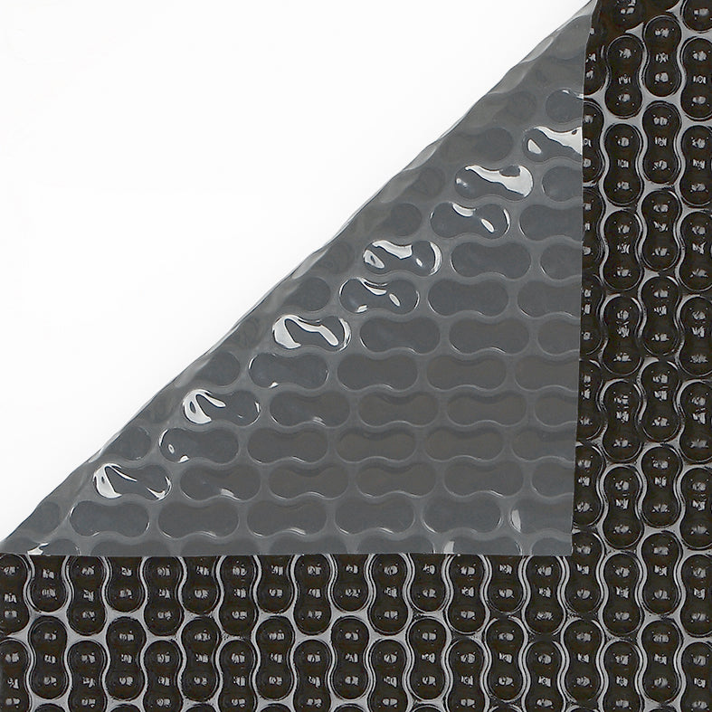 Couverture isothermique RaeGuard™ 500μ — couche argentée réfléchissante, bulles blanches, sur mesure France